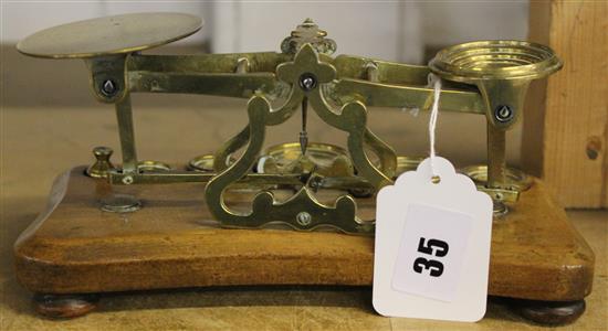 Set Edwardian brass postage scales and weights inscribed S. Mordan & Co, London